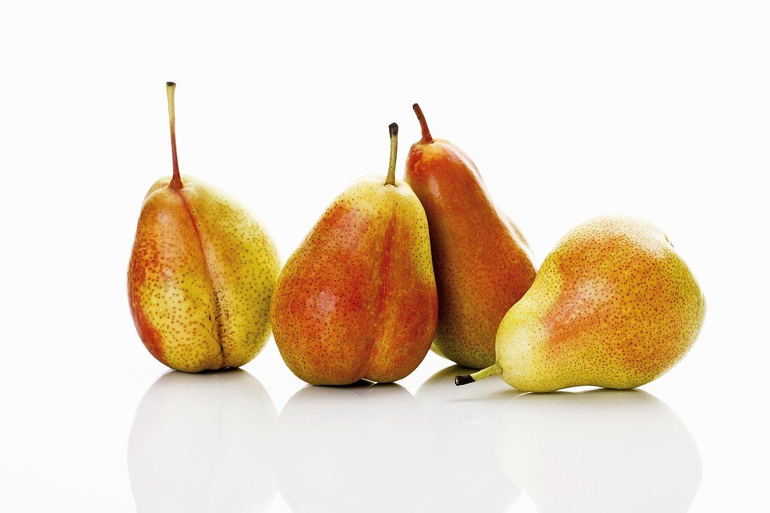 Four Forelle pears side by side