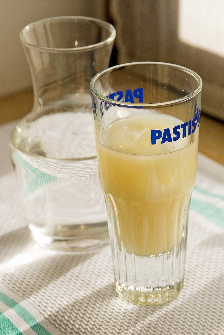 A glass of pastis with water