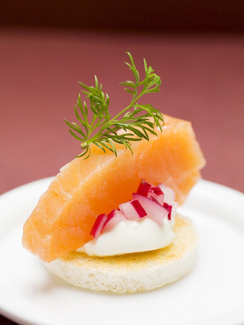 Salmon, onion and cream cheese canapé