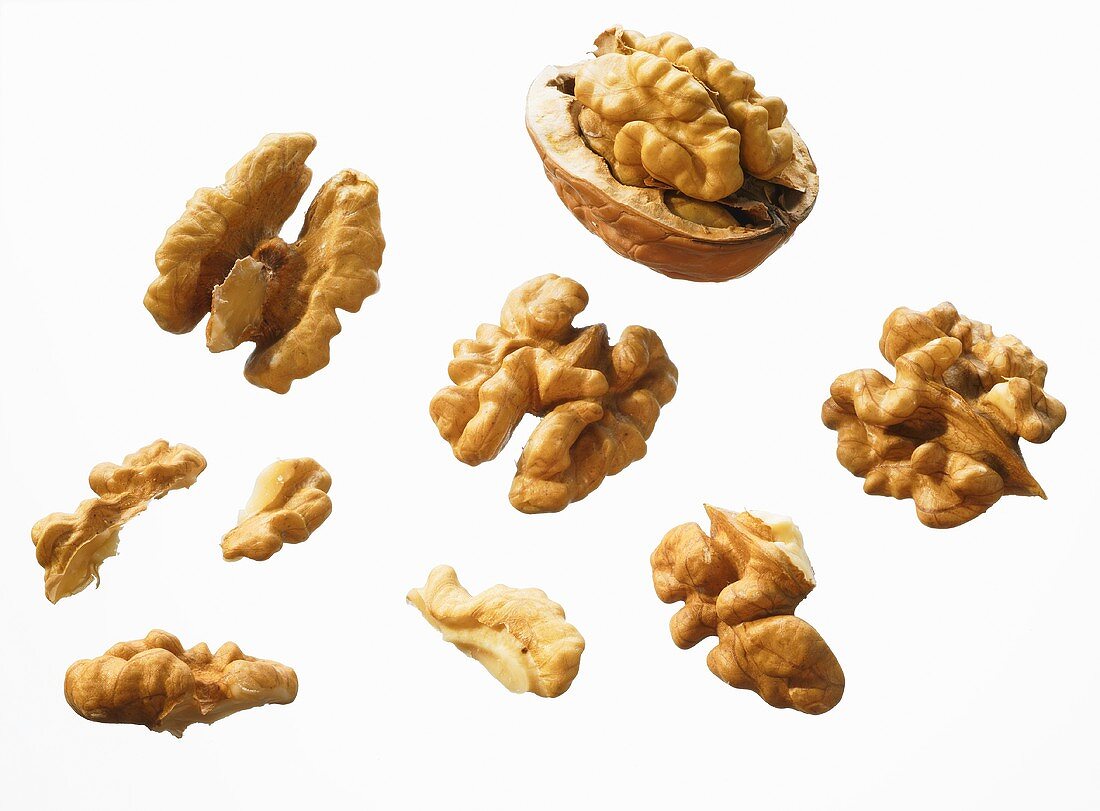 Several shelled walnuts