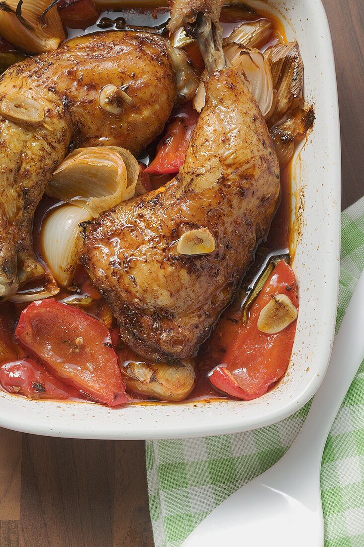 Oven-baked chicken legs with peppers