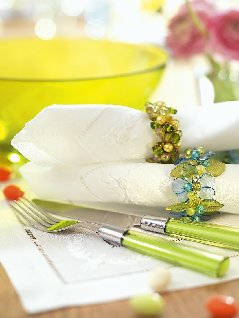 Fabric napkins with different napkin rings for Easter