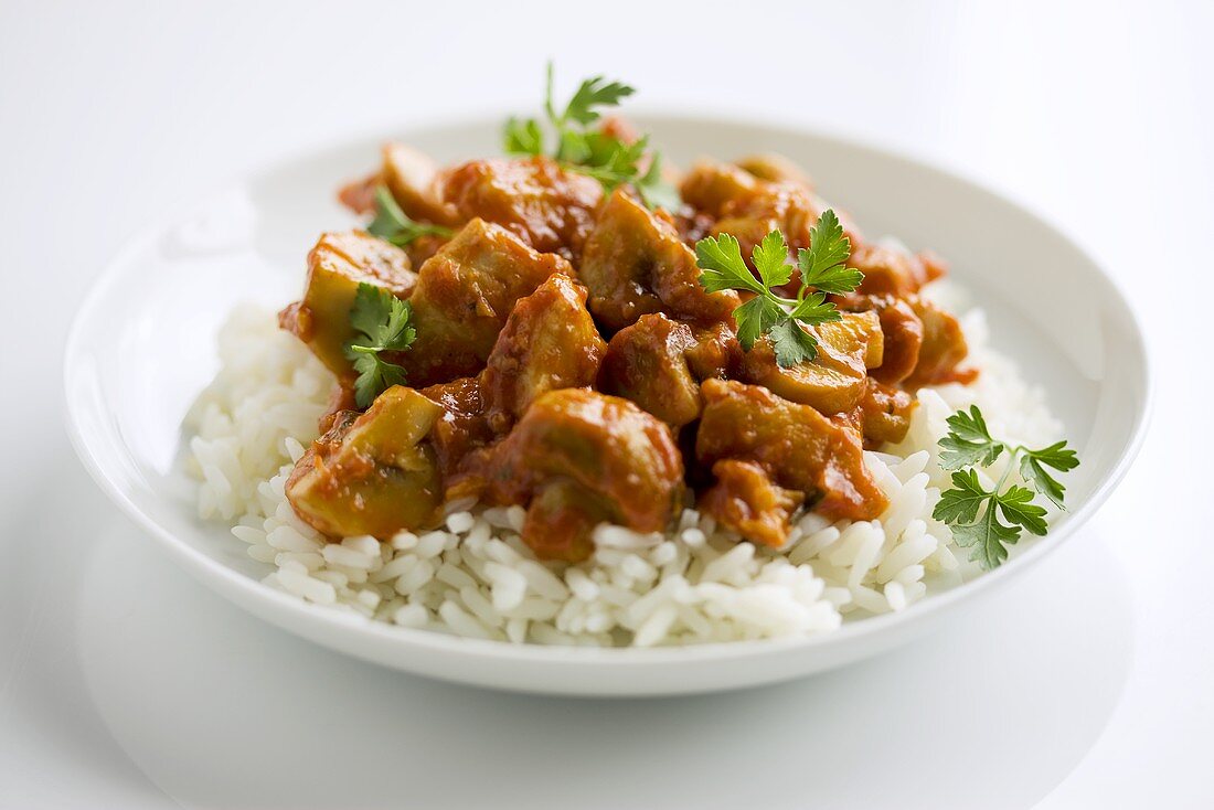 Hähnchen-Pilz-Ragout auf Reis