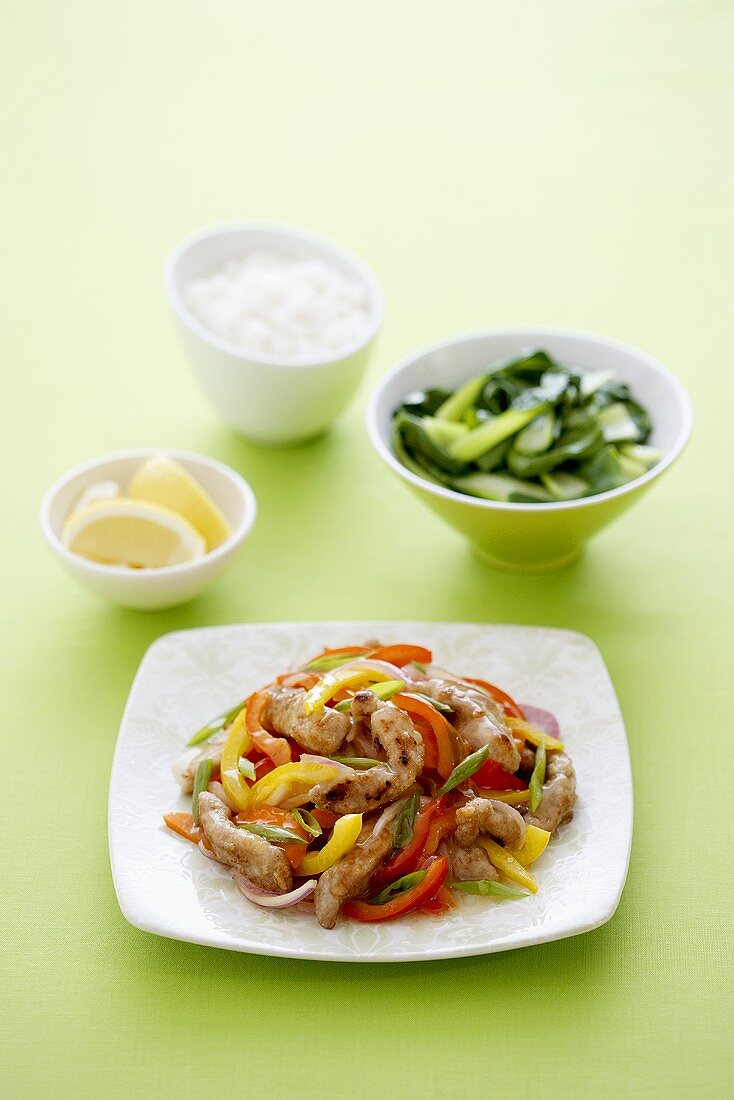 Pork in lemon sauce with peppers