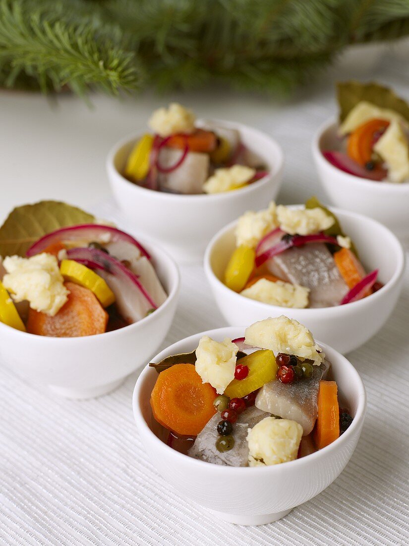 Pickled herrings with carrots and cheese for Christmas