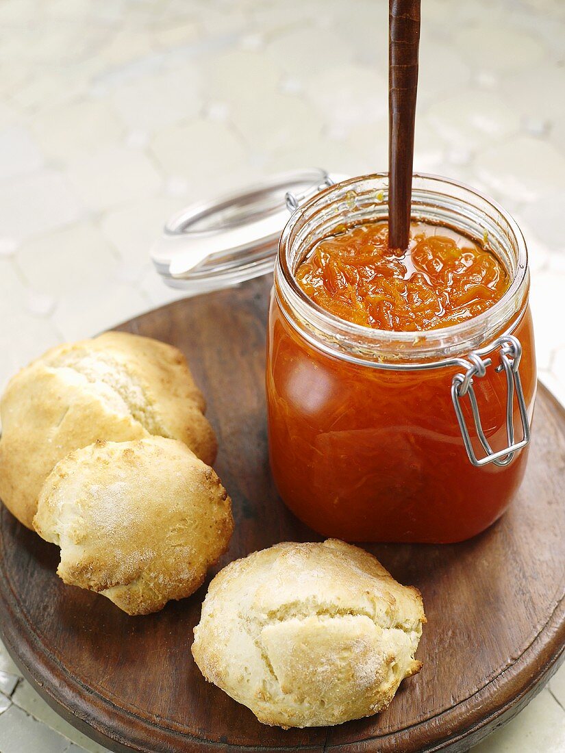 Scones and a jar of orange marmalade