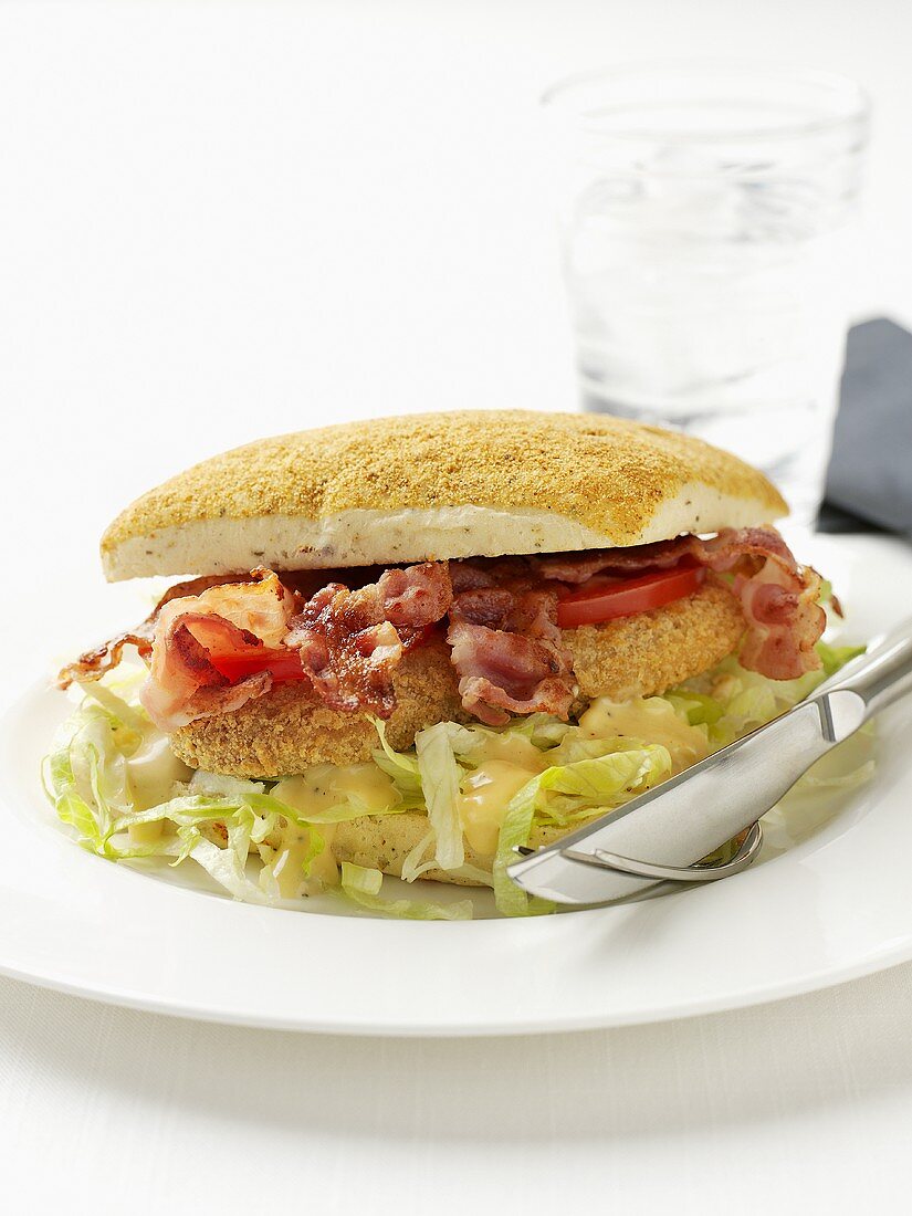 Bacon sandwich with lettuce and cheese sauce