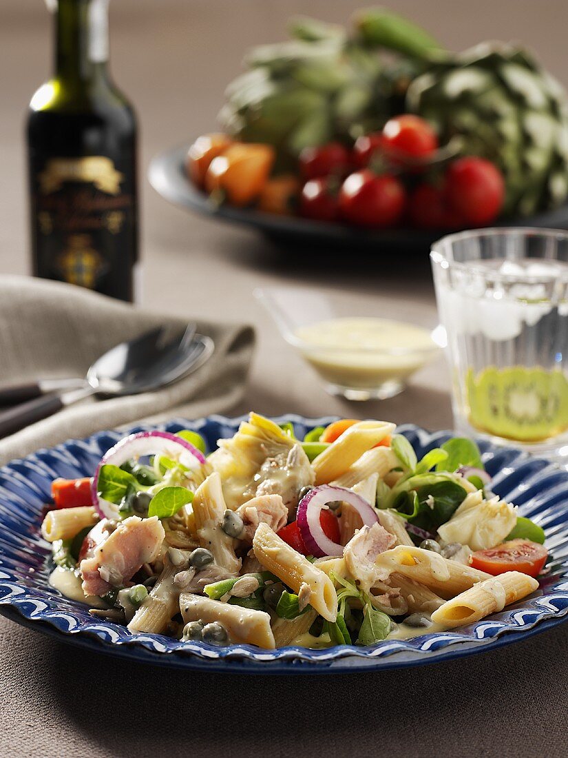 Penne salad with vegetables and capers