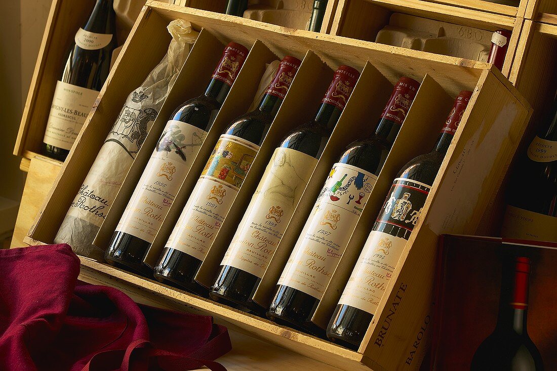 Old wines in wooden boxes
