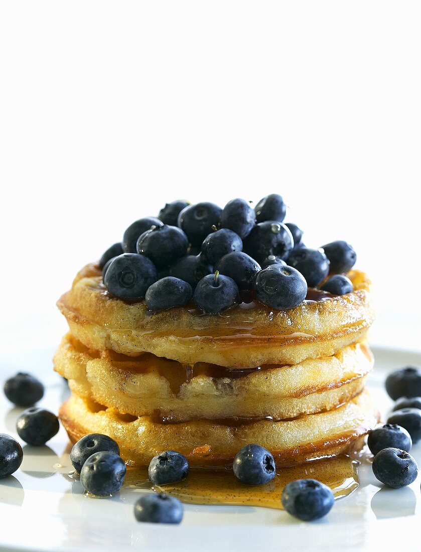 Waffles with maple syrup and blueberries