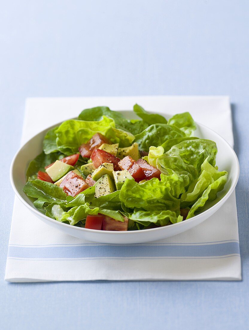 Lettuce with tomato and avocado