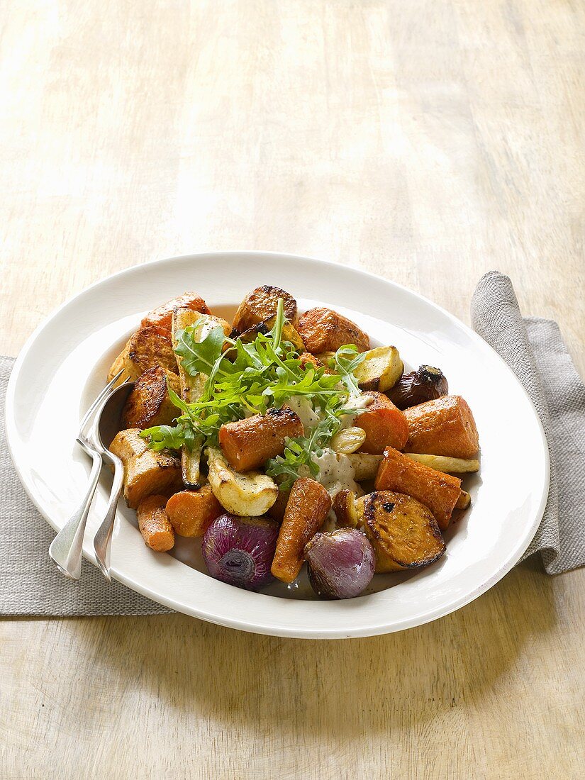 Roasted root vegetables with fresh rocket