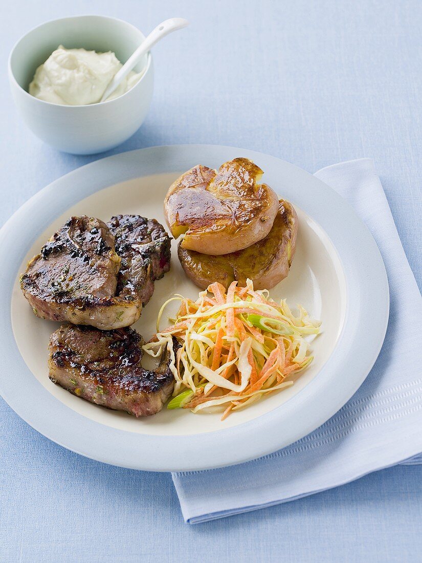 Lamb chops with potatoes and cabbage salad