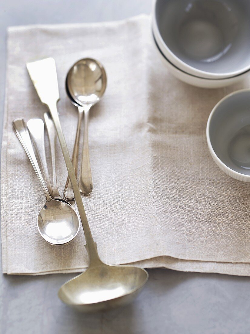Spoons, ladle and soup bowls