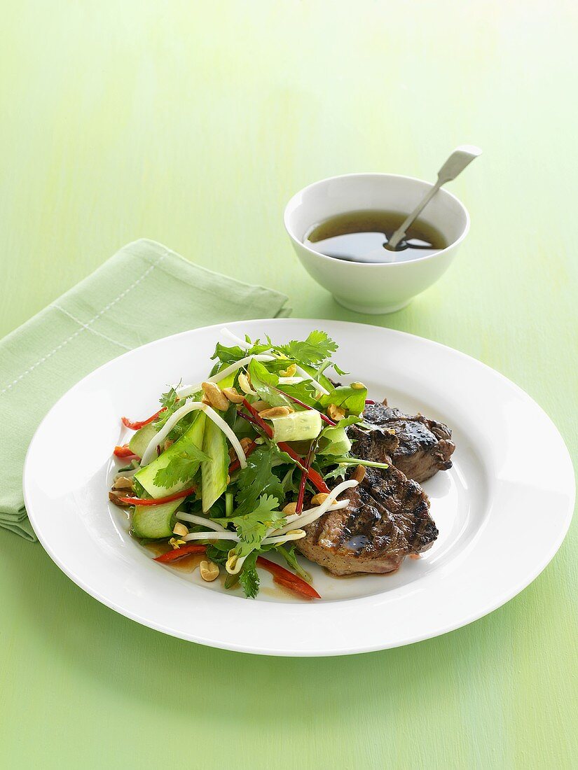 Steak with cucumber and coriander salad