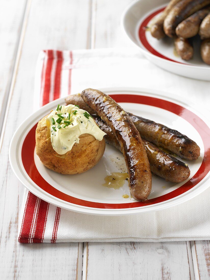 Honey glazed sausages and baked potato