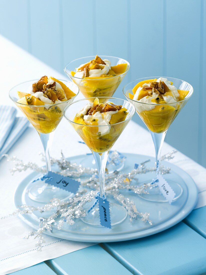 Mango and passion fruit salad with sweets for Christmas