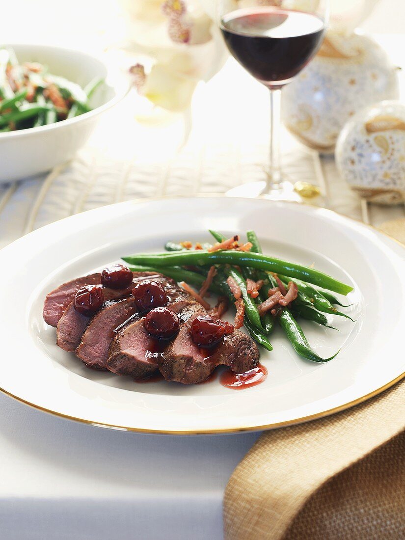 Duck with cherry sauce and green beans