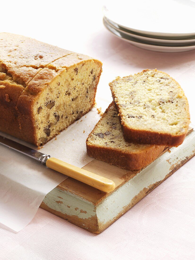 Lemon and walnut loaf, partly sliced