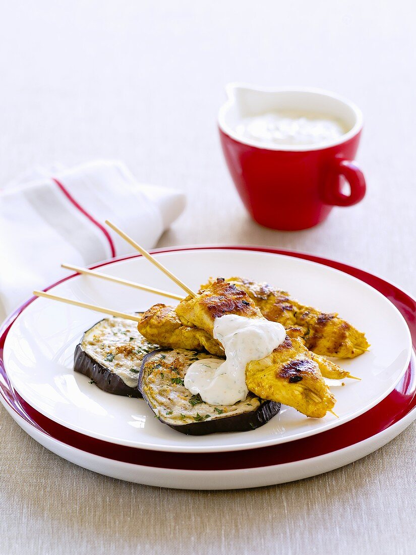 Chicken satay with aubergines and tzatziki