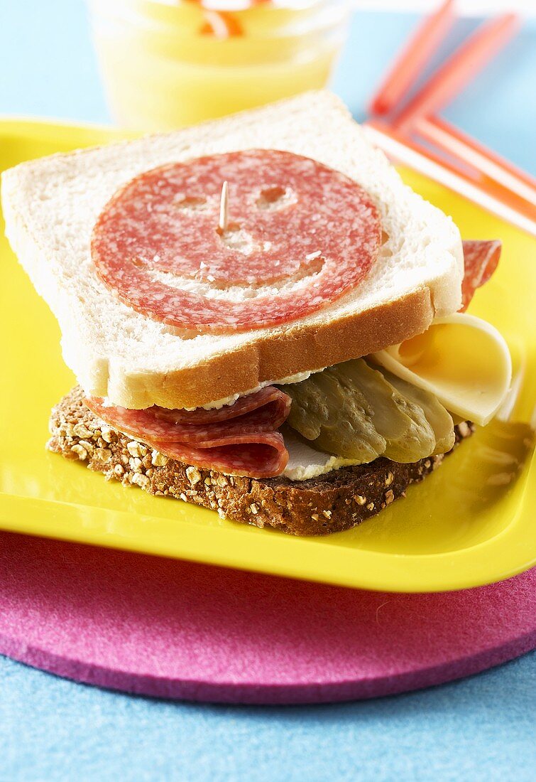 Salami, cheese and gherkin sandwich