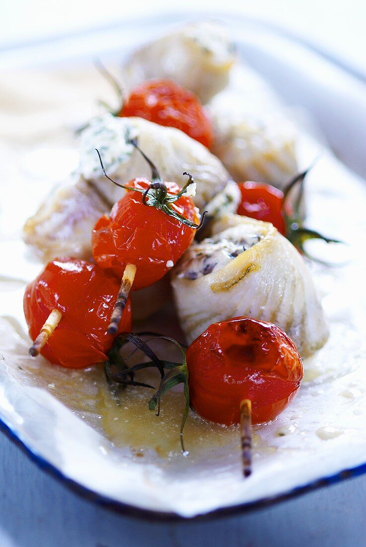 Grilled halibut rolls with tomatoes