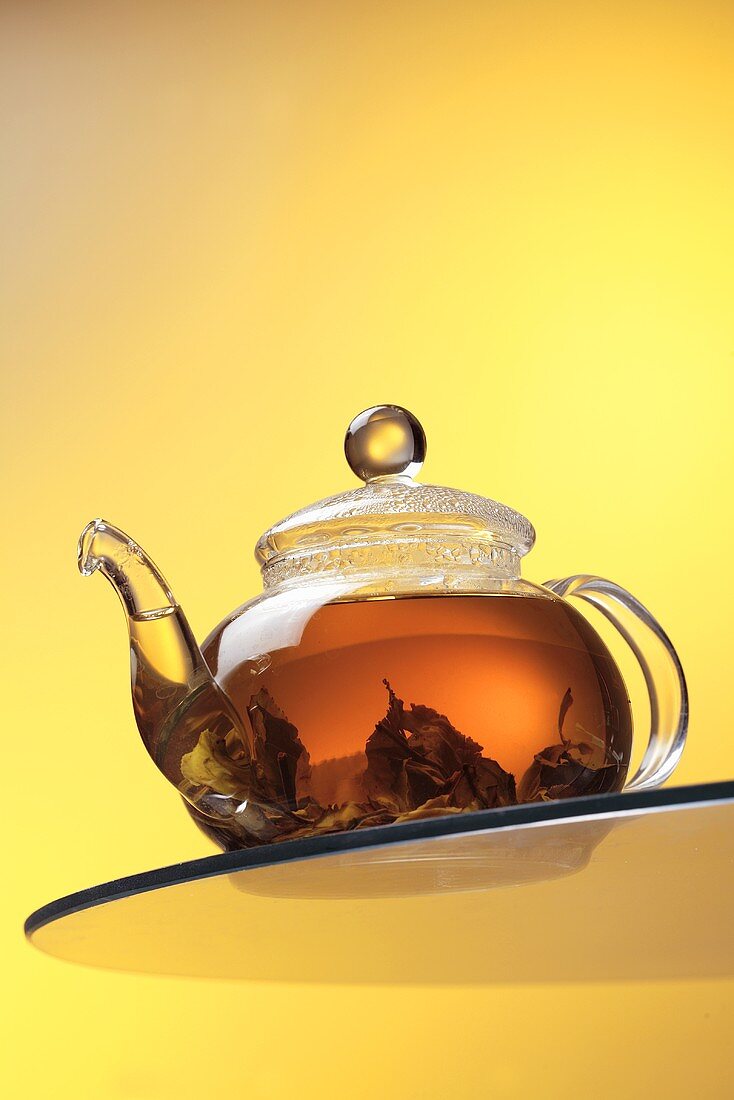 Ceylon tea in glass teapot