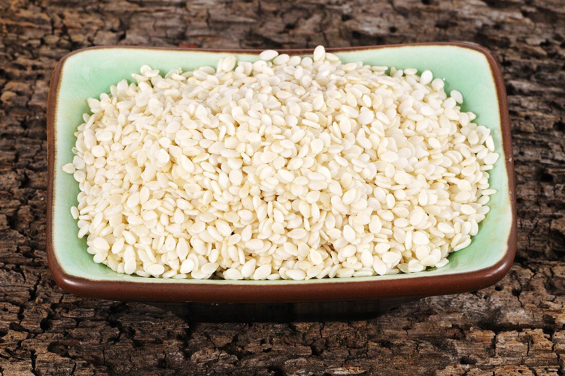 White sesame seeds in rectangular dish