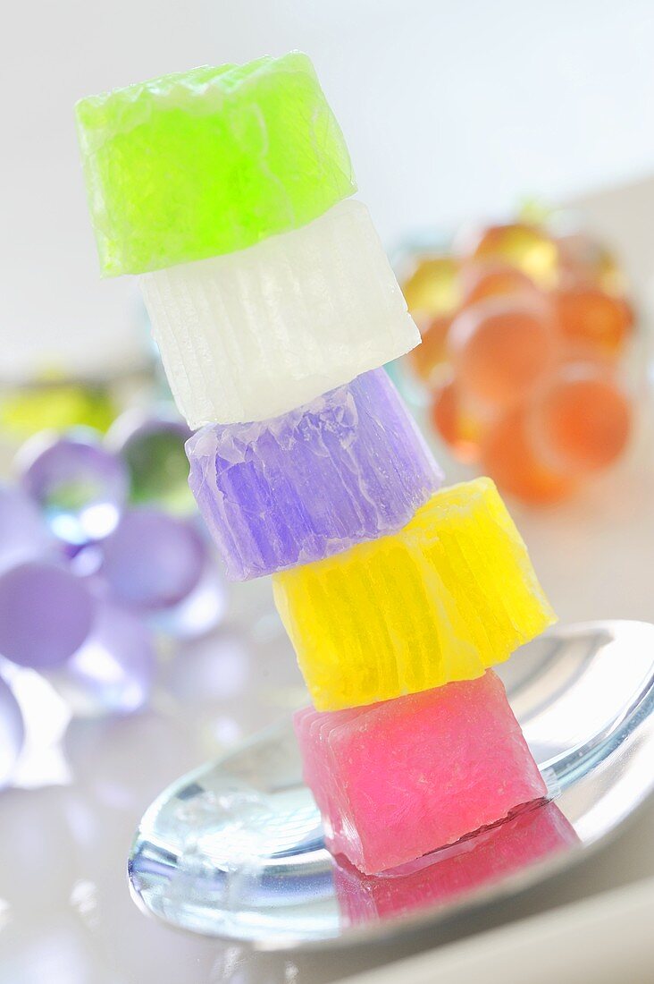 Coloured coconut jelly cubes, stacked (Thailand)