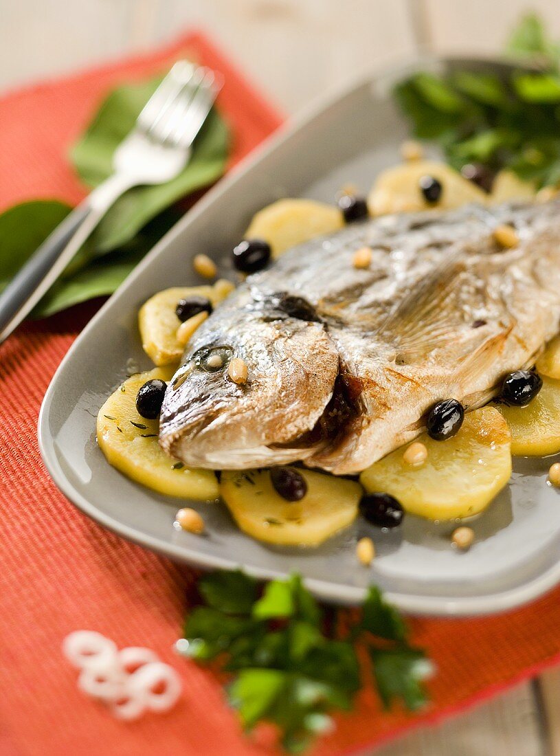 Orata alla ligure (Sea bream with potatoes & olives, Italy)