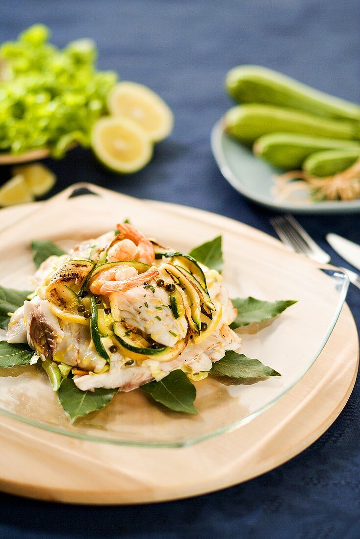 Sea bream fillet with courgettes and prawns