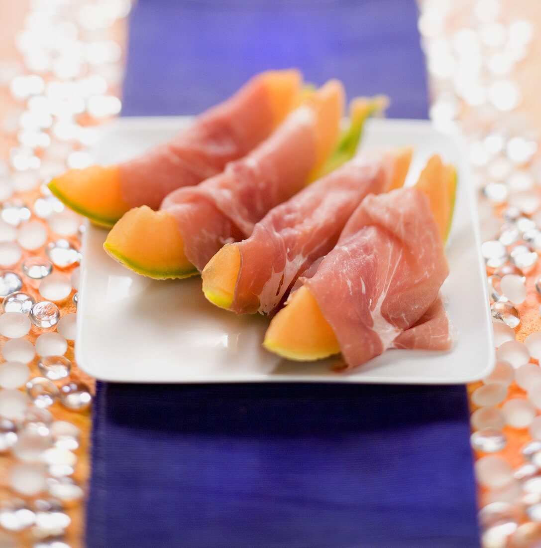Ham-wrapped melon wedges