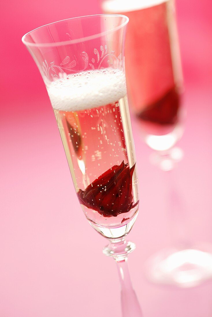 Champagne with hibiscus flowers