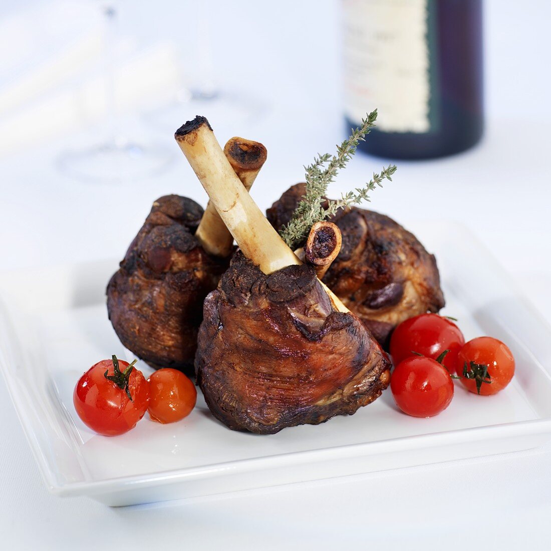 Legs of lamb with cherry tomatoes