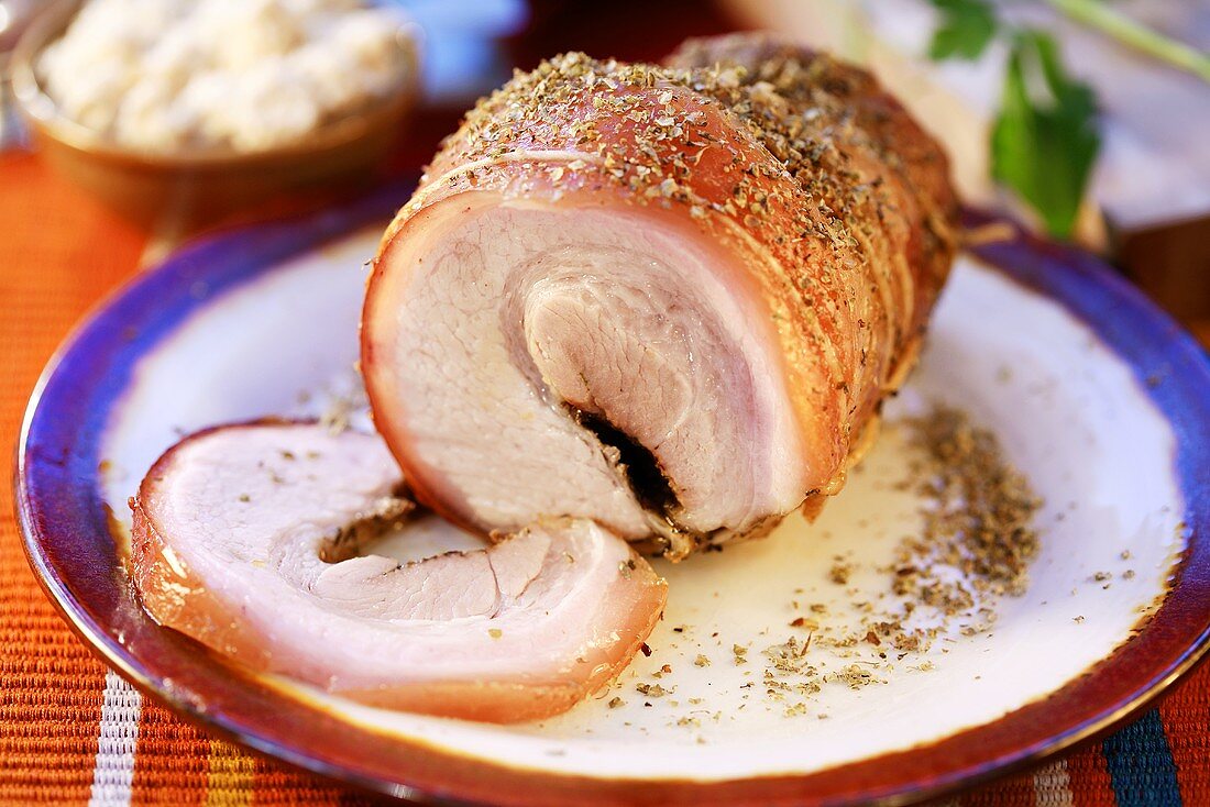 Rolled ham roast with herbs