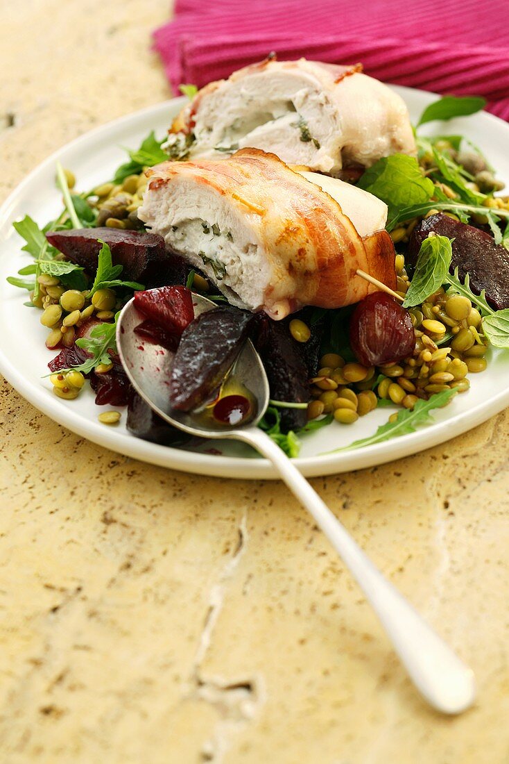 Chicken breast stuffed with goat's cheese, beetroot & lentil salad