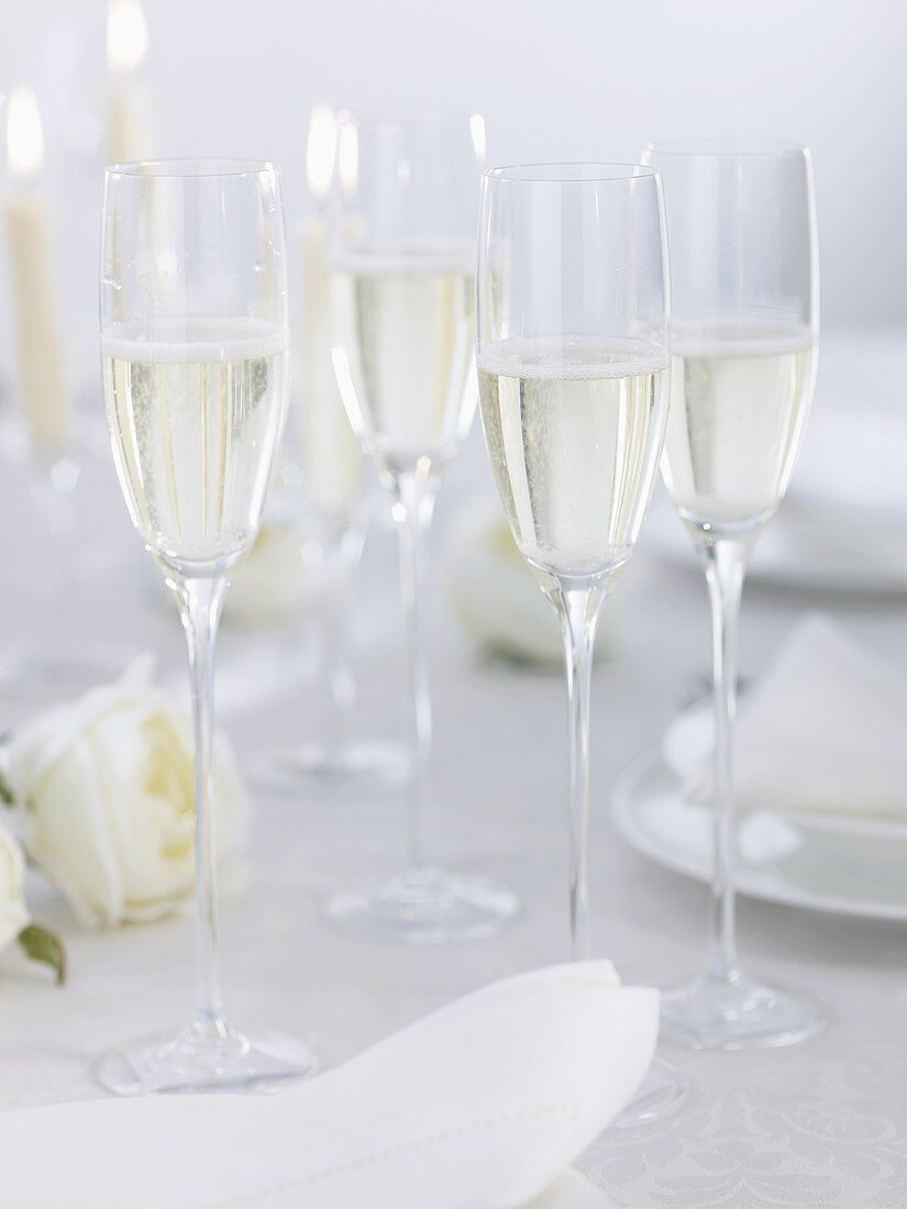 Champagne on table laid for special occasion