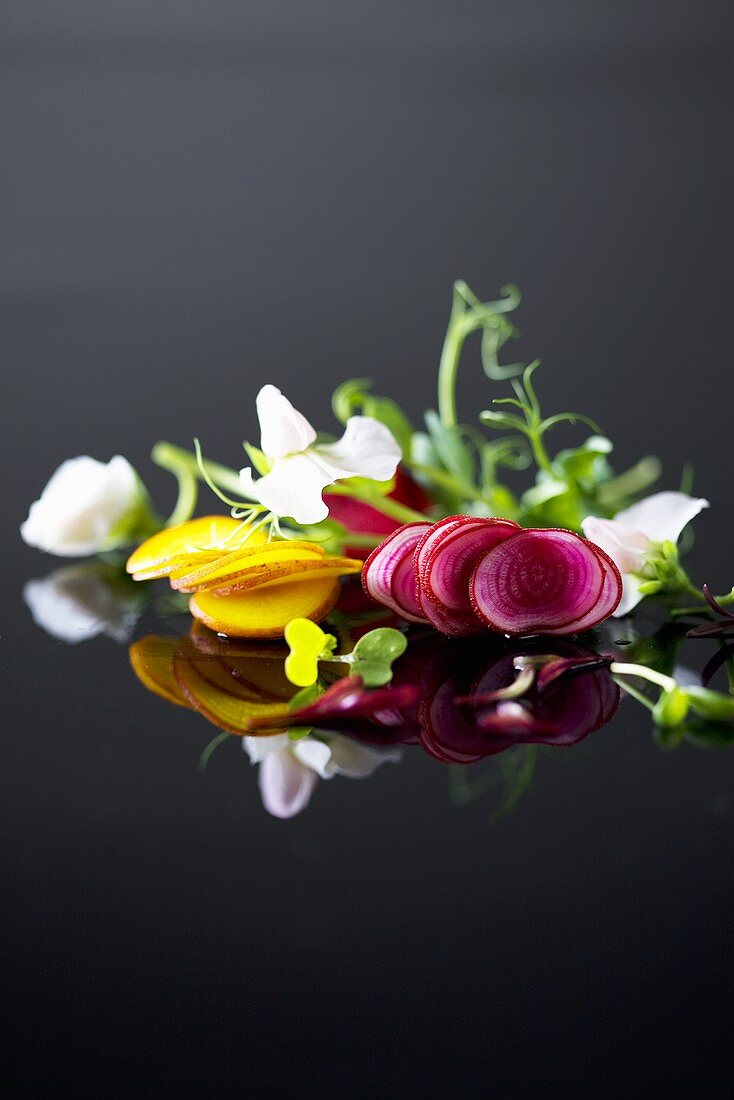 Slices of yellow and red onions with fresh herbs