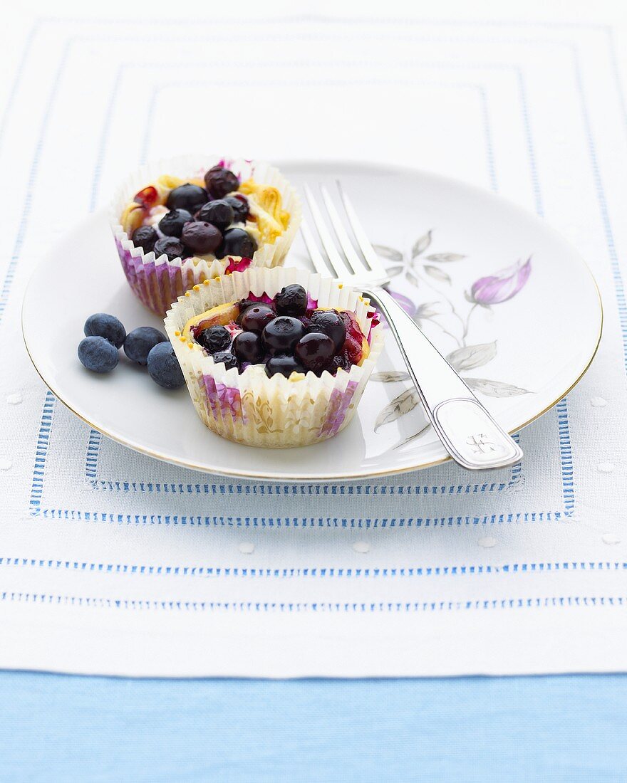 Two blueberry tarts