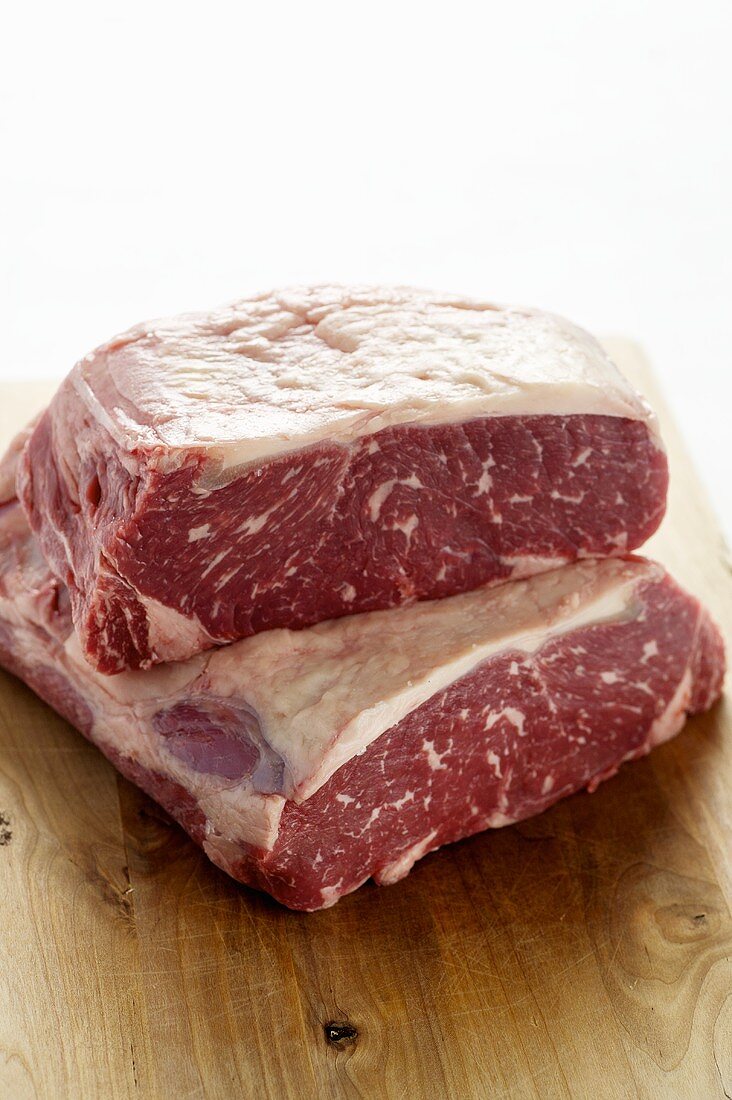 Fresh sirloin steak on chopping board
