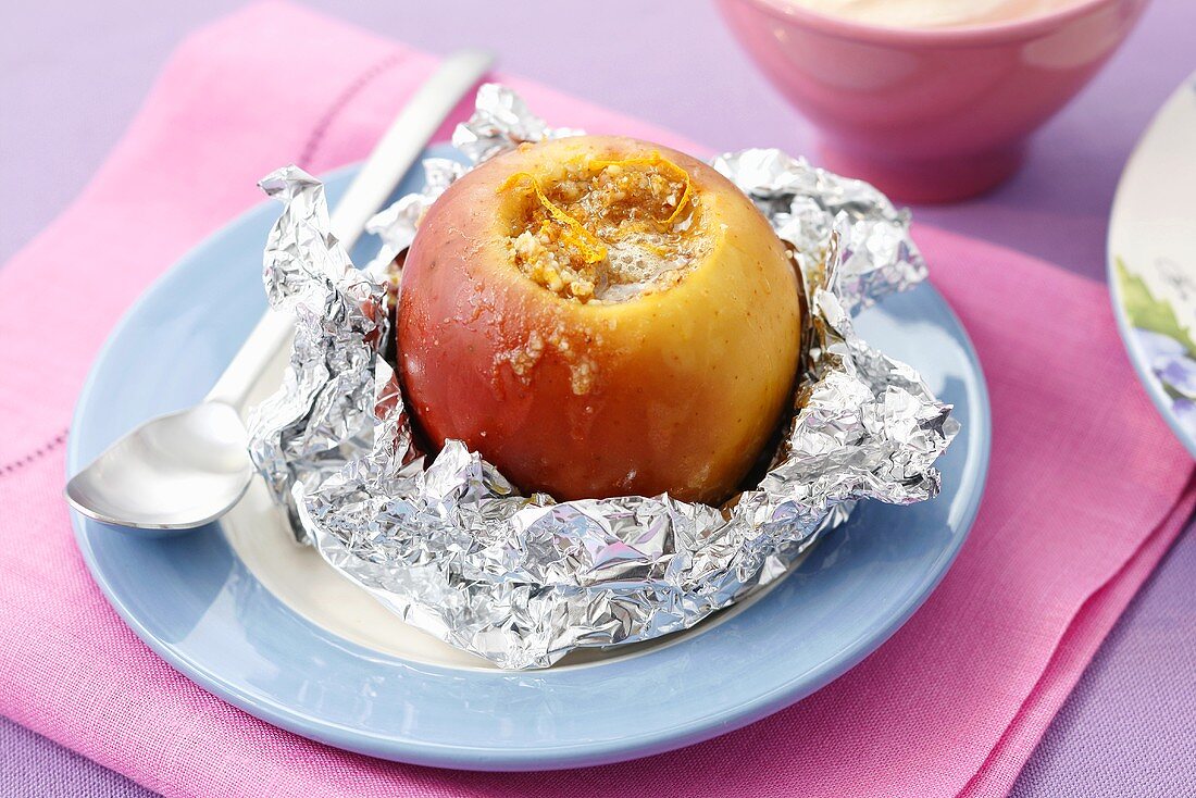 Baked apple with almonds, honey & orange zest baked in foil