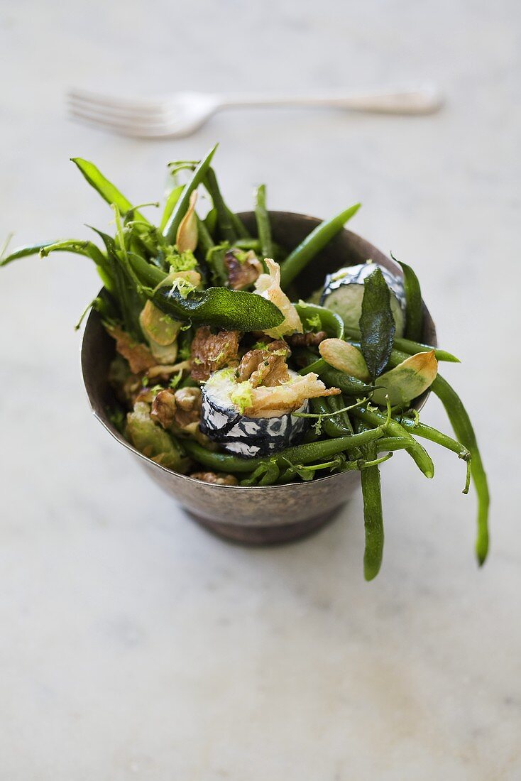 Deep-fried potatoes with sage, green beans, goat's cheese