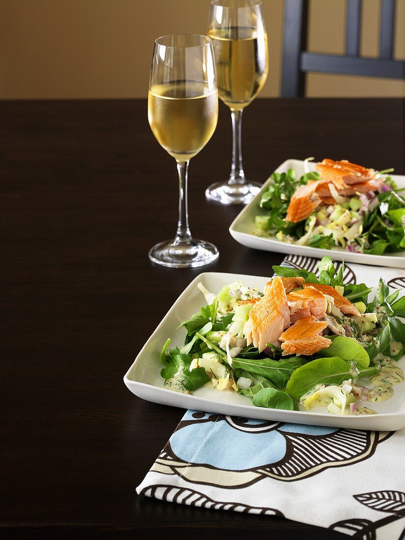 Salad leaves with herb dressing and smoked trout