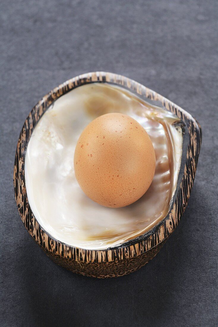 Hen's egg in mother-of-pearl shell
