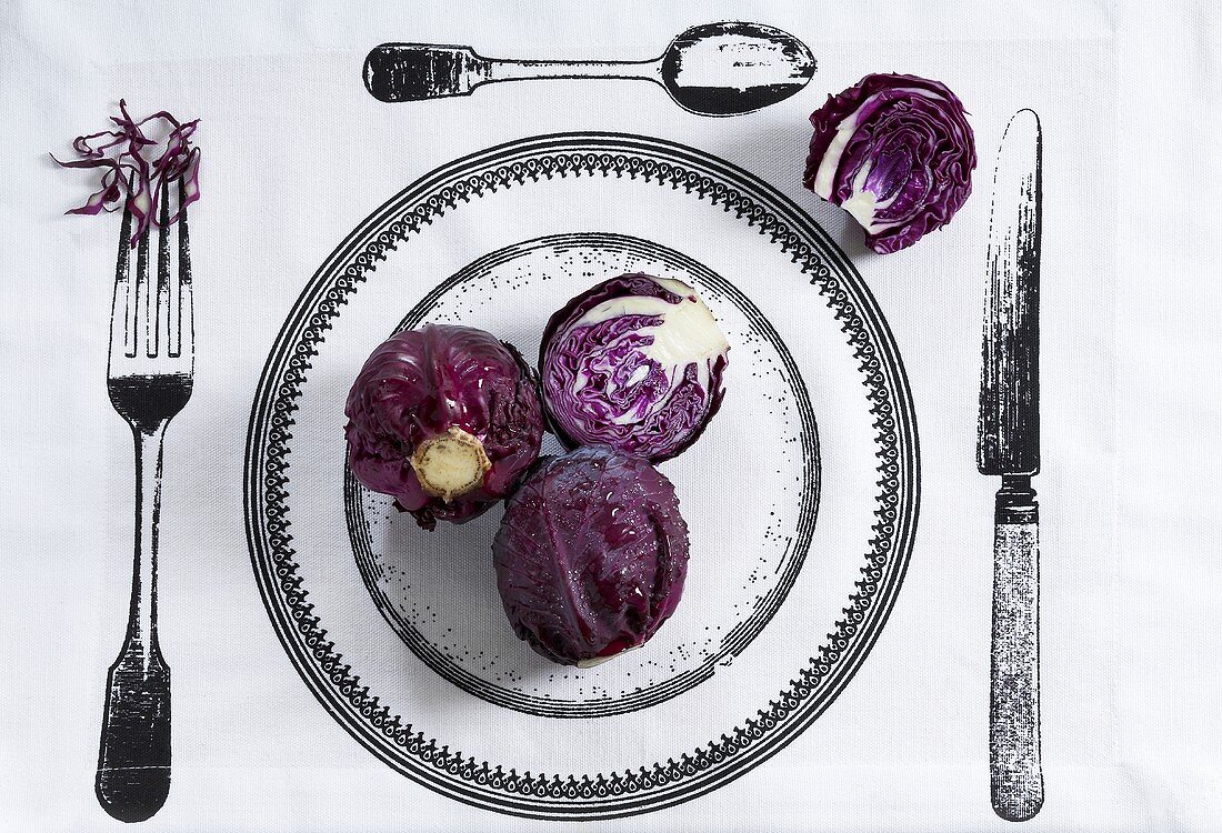 Red cabbage on printed tablecloth