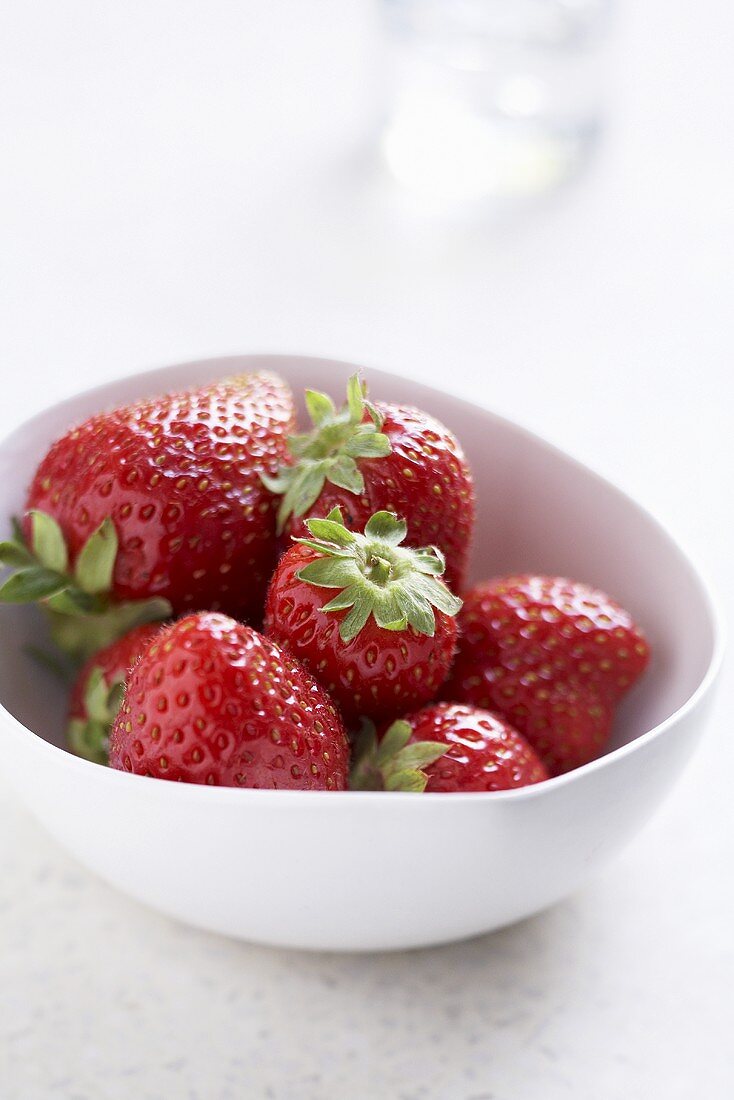 Strawberries in porcelain bowl