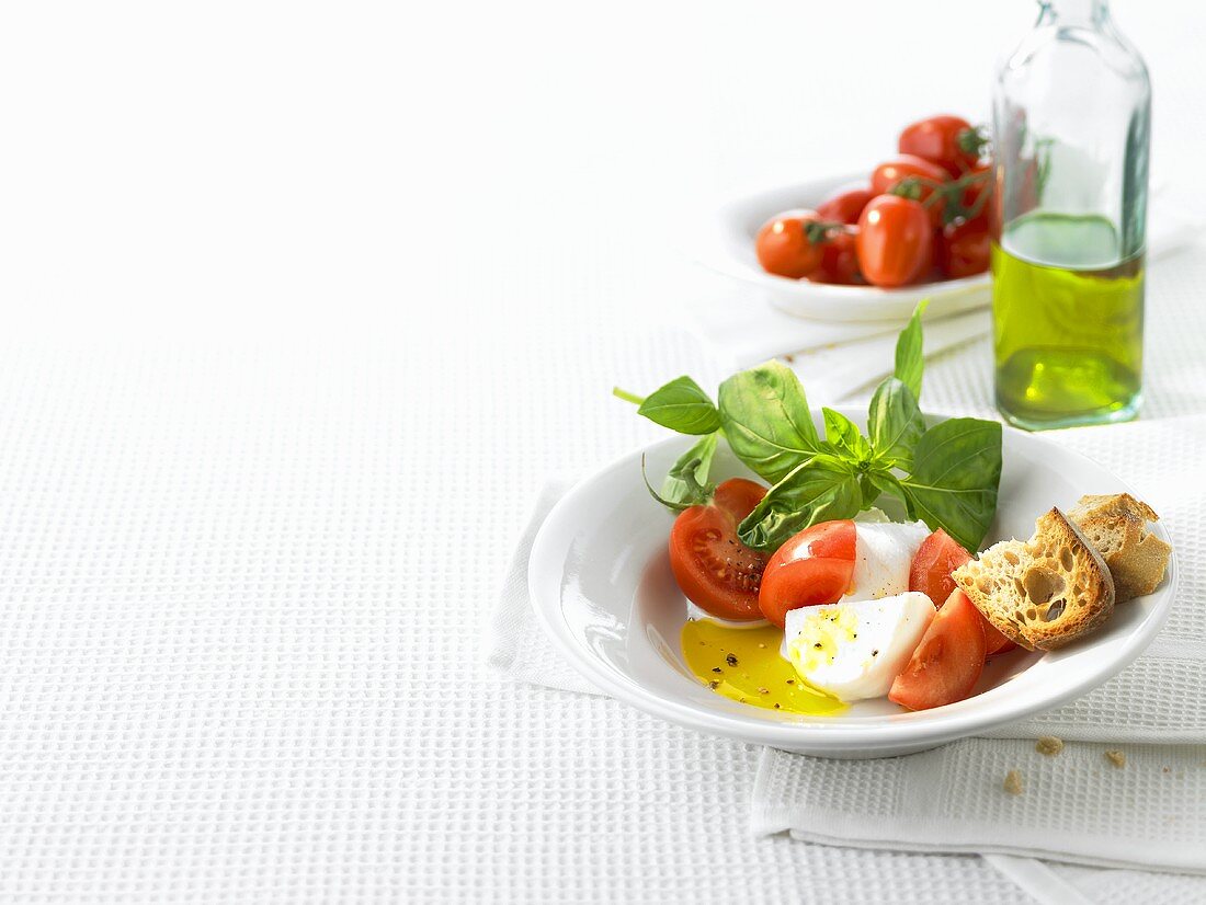 Tomatoes with mozzarella and basil