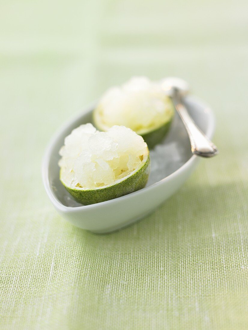 Lime sorbet in two hollowed-out lime skins