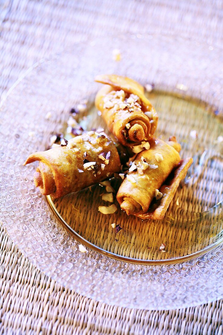 Deep-fried pastry rolls with hazelnuts
