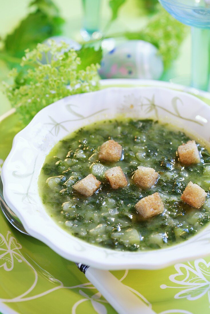 Herb soup with croutons for Easter